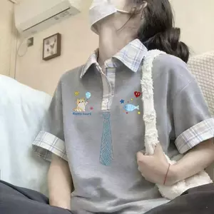 Áo Polo nữ mùa hè, cổ đứng, form rộng, chất liệu thoáng mát.