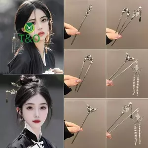 Kẹp tóc phong cách Trung Hoa cổ điển với hoa văn đẹp mắt, phù hợp làm phụ kiện tóc đuôi ngựa thanh lịch.