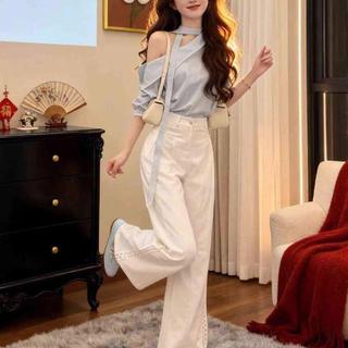 Bộ đồ áo sơ mi màu xanh dành cho nữ, thiết kế ôm, cảm giác thoải mái khi mặc, phù hợp mùa hè 2026