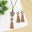 Dây chuyền gỗ phong cách bohemian vintage với viền mặt hình vòng tròn dài - Trang sức mới