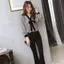 Áo sơ mi cổ chữ V dài tay nữ, thiết kế rộng rãi với chi tiết nơ thời trang