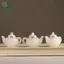 Ấm trà in hình Openwork phong cách Trung Quốc với mặt dây chuyền túi và móc khóa ô tô