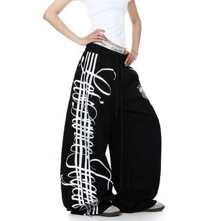 Quần ống rộng họa tiết nổi bật với thắt lưng dây rút dành cho thời trang đô thị