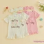 Bộ áo liền quần cổ tròn tay ngắn in chữ cho bé gái có băng đô