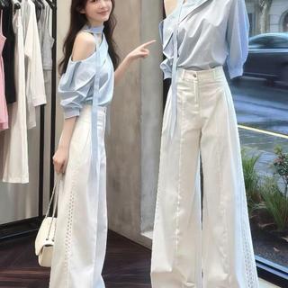 Bộ đồ áo sơ mi màu xanh dành cho nữ, thiết kế ôm, cảm giác thoải mái khi mặc, phù hợp mùa hè 2026
