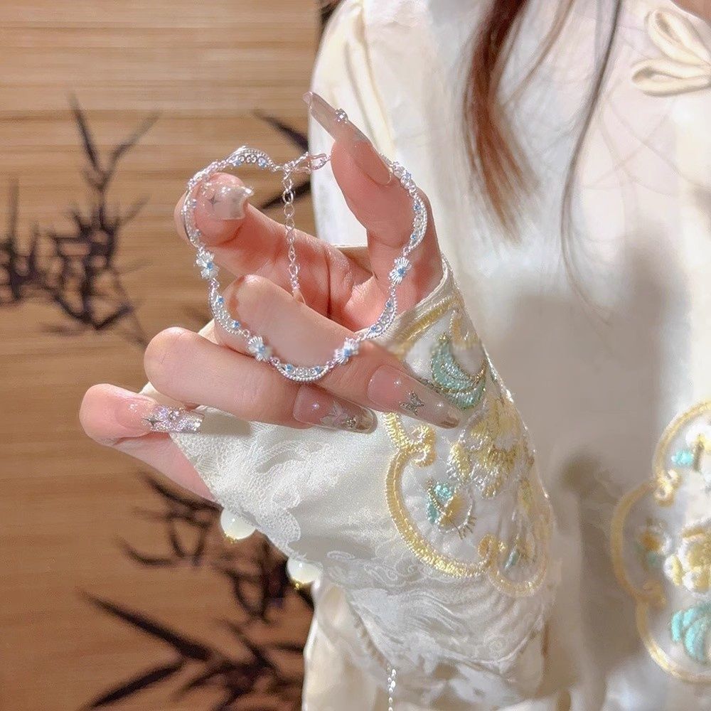 Vòng tay nữ màu xanh có nơ ngọt ngào - Quà tặng thời trang