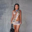 Váy mini bodycon họa tiết hổ, cổ không tay, phong cách hoang dã