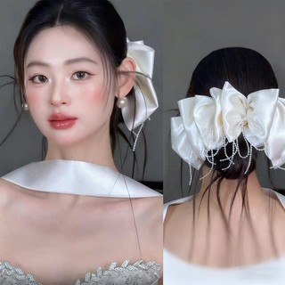 Tua rua ngọc trai giả cao cấp với nơ lớn kẹp tóc, phù hợp cho đám cưới và mũ cô dâu