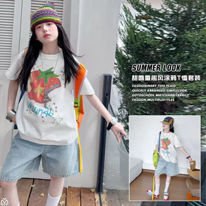 Áo thun hoạt hình bé gái Apple Graffiti mùa hè 2026 Phong cách mới cho trẻ em Áo thường ngày