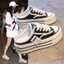 Canvas Baotou Nửa Dép Nữ Mùa Xuân 2023 Phong Cách Mới Đế Dày Mặc Bên Ngoài Người Lười Không Có Gót Bên Trong Tăng Chiều Cao Giày Trắng RA1A