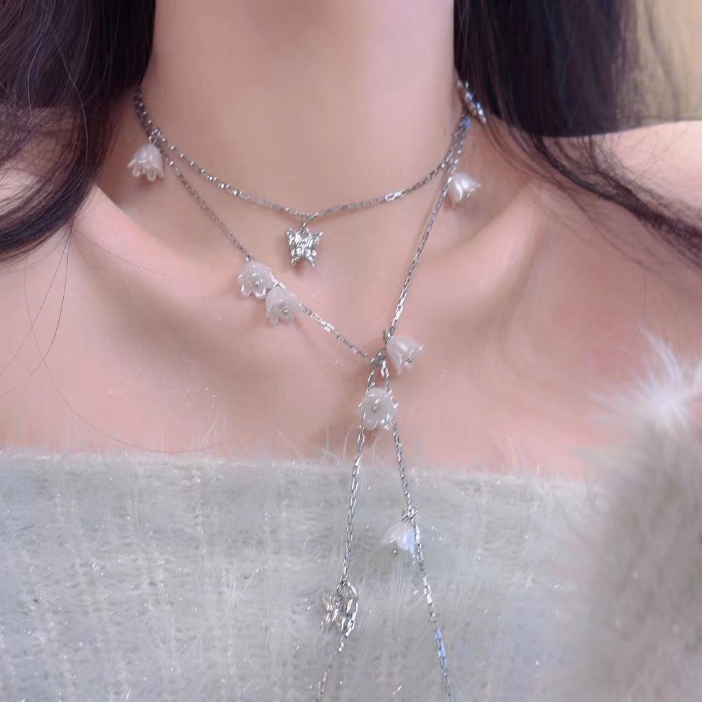 Đáy chuyền nữ thời trang Pháp với ngọc trai và họa tiết bướm, hạt chuông, thiết kế đa năng và cá tính