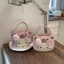 Bán Dễ Thương hellokitty Túi Xách Nữ 2026 Phong Cách Mới Màu Hồng Túi Đeo Vai Giá Trị Cao Sinh Viên Đảng Túi Messenger