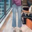 Slit Slimer Look Hơi co giãn eo cao tám điểm đến mắt cá chân Quần jean loe