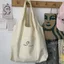 Phiên Bản Hàn Quốc Túi Vải Nữ Thu Đông Túi Đeo Vai Độc Đáo Phong Cách Preppy Vải Lười Phong Cách Hoạt Hình Đơn Giản Túi Tote RCIG