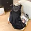 Áo vest cổ chữ U màu xanh phong cách lười biếng Áo dệt kim xẻ tà Áo dài vừa phải