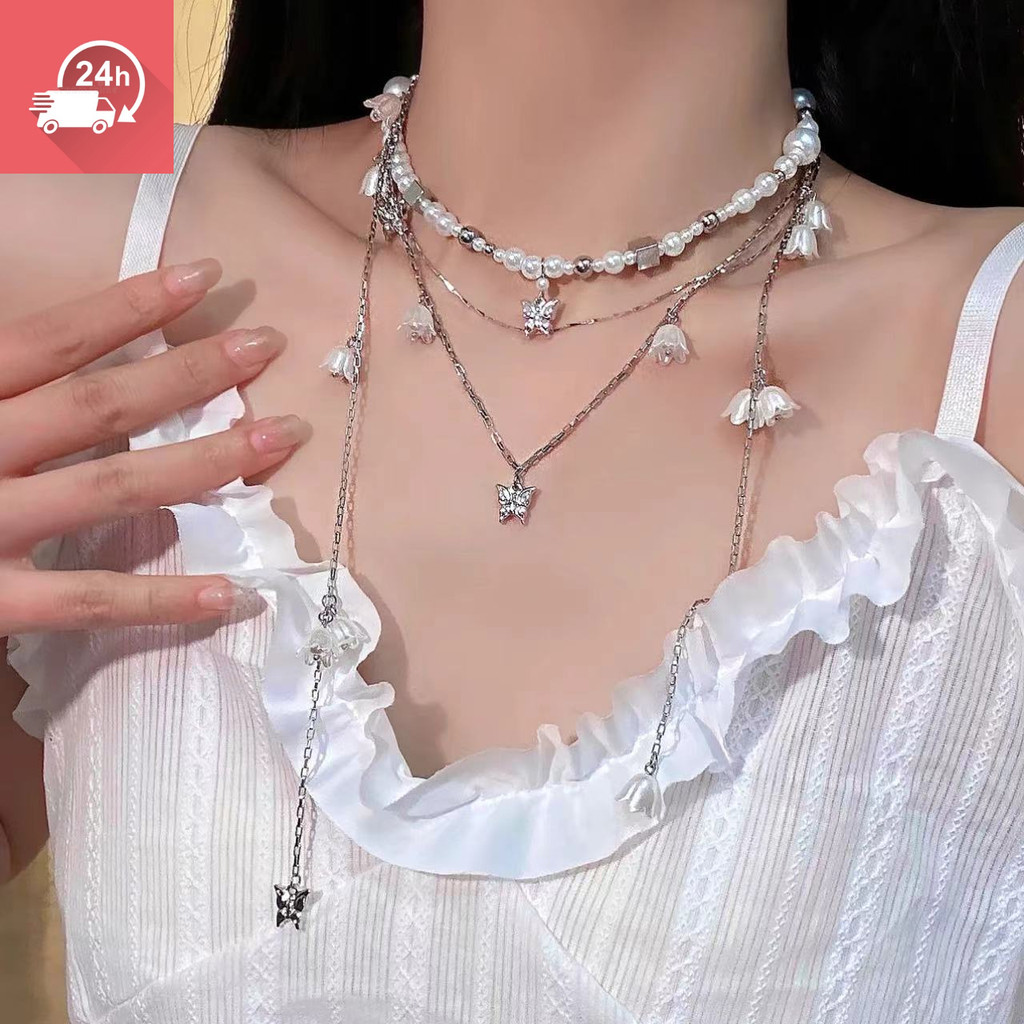 Đáy chuyền nữ thời trang Pháp với ngọc trai và họa tiết bướm, hạt chuông, thiết kế đa năng và cá tính