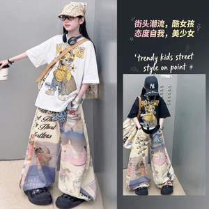 Bé Gái Hoạt Hình Gấu Graffiti Áo Thun Tay Ngắn Mùa Hè 2026 Phong Cách Mới Trẻ Em Thời Trang Rời Top