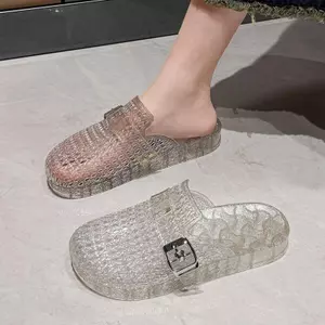 Dép bé gái pha lê trong suốt mùa hè đơn giản Boken mặc bên ngoài Nhấp nháy Flat Hollow Dép Baotou phù hợp