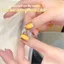 Năm Mới Fortune Golden Cat 's Eye Sequins Sơn Móng Tay Keo 2025 Phổ Biến Trắng Nhấp Nháy Móng Tay Vàng
