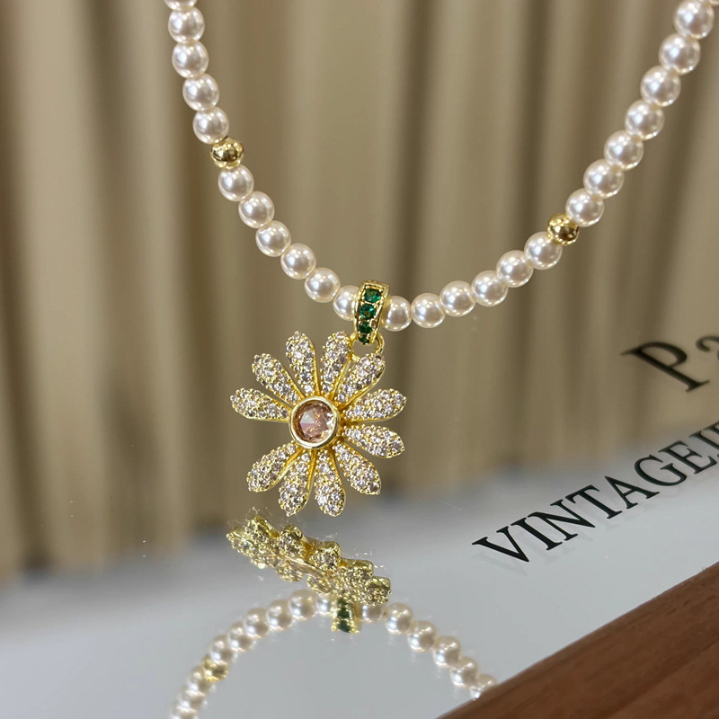 Vòng cổ ngọc trai hoa cúc Zircon thời trang