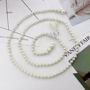 Đầm nơ ngọt ngào với chi tiết ngọc trai và dây thắt lưng kim cương giả - Phụ kiện cưới dành cho nữ