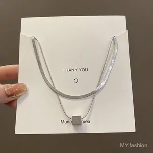 Vòng cổ thép titan hình học hai lớp, không phai màu, phù hợp bé gái