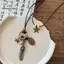 Nhíp cổ điển boho với kim loại và lông vũ, dây xích mặt dây chuyền handmade dành cho nữ