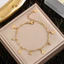 Vòng tay thép titan mạ vàng 18K với thiết kế bướm và tua rua màu sắc thời trang dành cho nữ