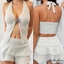 Bộ bikini nữ bao gồm áo ngực hình sao biển, quat và váy xếp lớp