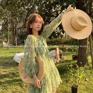 Váy dài tay hoa xanh dành cho người đầy đặn, phong cách thoải mái, quần áo nữ đẹp mắt cho mùa nghỉ mát.