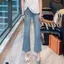 Slit Slimer Look Hơi co giãn eo cao tám điểm đến mắt cá chân Quần jean loe