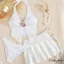 Bộ bikini nữ bao gồm áo ngực hình sao biển, quat và váy xếp lớp