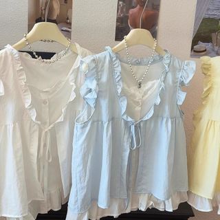 Màu sắc tương phản kem vàng ngọt ngào, áo sơ mi búp bê không tay ren, phong cách Hàn Quốc mới lạ cho mùa hè 2026