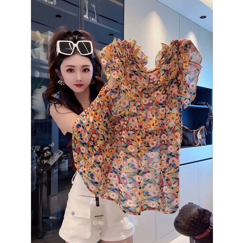 [Thời gian giới hạn Seckill] Mùa hè 2026 Phong cách mới Phong cách phương Tây In dáng rộng mỏng hơn Nhìn Agaric Edge Cổ tròn Xù Áo sơ mi voan bay tay