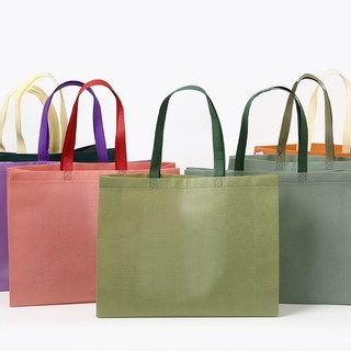 Túi vải không dệt kích thước 25x35x10 cm có quai vải.