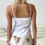 Áo vest babydoll phong cách Y2K dành cho nữ với ren dễ thương, dây vai mỏng và cổ chữ V, dáng xòe nhẹ