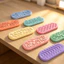 < Pluscloth > Bộ 8 viên đá silicon cho trẻ em – Đồ chơi thần tài lo lắng có họa tiết để giảm căng thẳng Tập trung hỗ trợ lo âu – Đá di động an toàn bền bỉ cho trẻ em Giảm căng thẳng