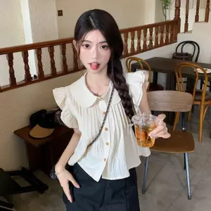Cổ búp bê ngọt ngào Tay bay nhỏ xếp li Thiết kế giảm tuổi thon gọn hơn Áo sơ mi dáng rộng Áo sơ mi ngắn