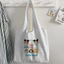 Phiên Bản Hàn Quốc Túi Vải Nữ Thu Đông Túi Đeo Vai Độc Đáo Phong Cách Preppy Vải Lười Phong Cách Hoạt Hình Đơn Giản Túi Tote RCIG