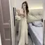 Tính khí mỏng hơn trông eo cao xếp ly xã hội Bộ đồ nữ cổ tròn dệt kim Top Váy thời trang phù hợp cho nữ