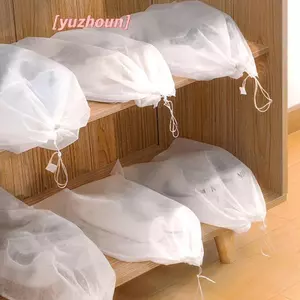 Bộ 50 Vỏ Chống Bụi Cho Giày - Dây Rút Trong Suốt, Phù Hợp Bảo Quản Và Du Lịch