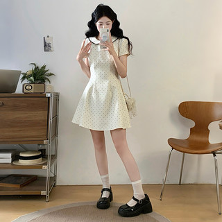 Đầm nữ dáng chữ A chấm bi điểm xuyết nơ xinh xắn, thích hợp cho mùa hè.