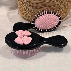 【Roshy】lược trang điểm mini dễ thương Lược đệm khí hình nơ cho bé gái lược massage cầm tay.