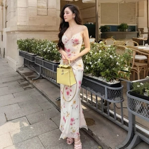 Cutenew Váy Sling Off Tay Áo Lưng Skinny Hông Kẹp Cá Tính Niche Hot Chick Thời Trang Tính Khí Phong Cách Nóng Mới