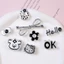 Set Charm Hello Kitty Bạc Đen 🖤🎀 Mix Nơ Kim Loại Flower & Donut Cute Style Hàn Quốc Sang Chảnh Gắn Dép Cực Xinh