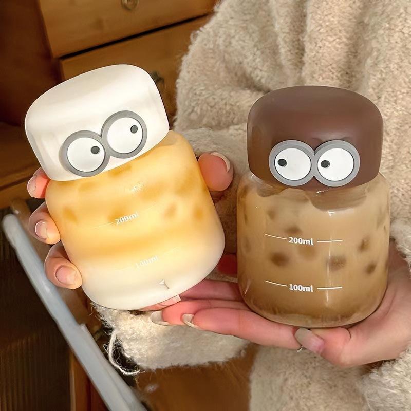 Cốc Thủy Tinh Mini 300ml In Hình Đôi Mắt Cute – Bình Nước Chia Vạch Dáng Lùn Đáng Yêu
