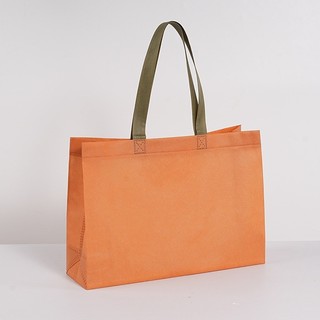 Túi vải không dệt kích thước 25x35x10 cm có quai vải.