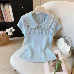 Áo blouse cổ búp bê màu xanh ngọc trai, thiết kế thoáng mát phù hợp mùa hè
