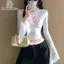 Áo sơ mi crop top nữ chất liệu tweed và ren, tay chuông, thiết kế gợi cảm, mỏng nhẹ phù hợp thời trang hiện đại