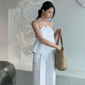 Set thiết kế áo trắng cổ yếm khoen ngực + quần suông MyaHouse